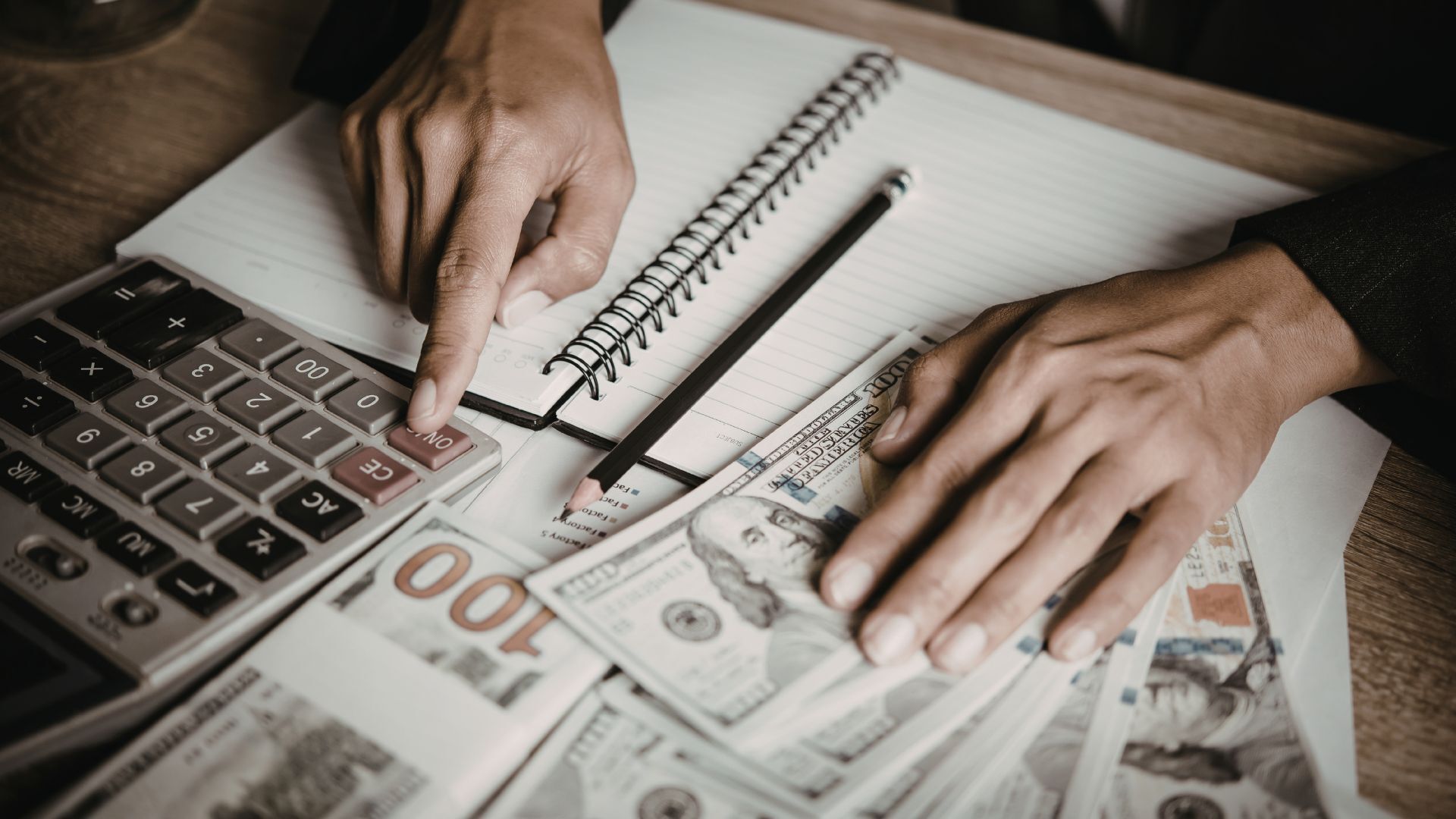 Business owner reviewing a real-time dashboard for financial clarity with clean books, cash flow, and profitability metrics.